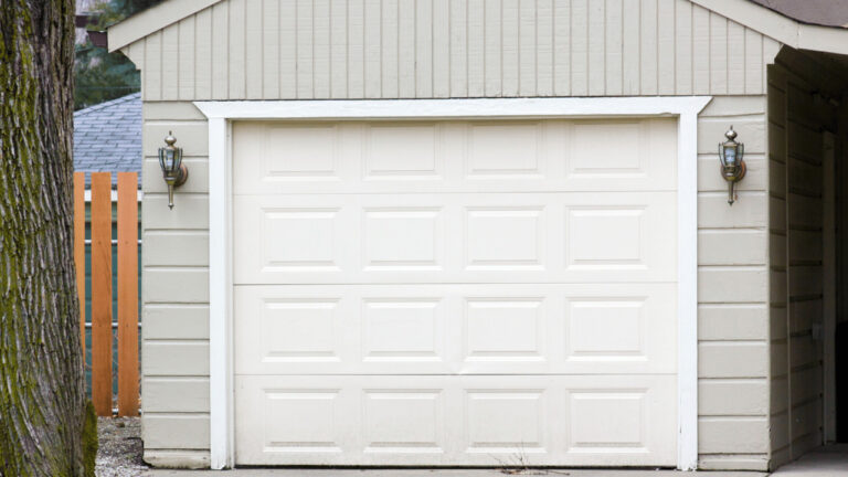 How do you recalibrate a garage door?